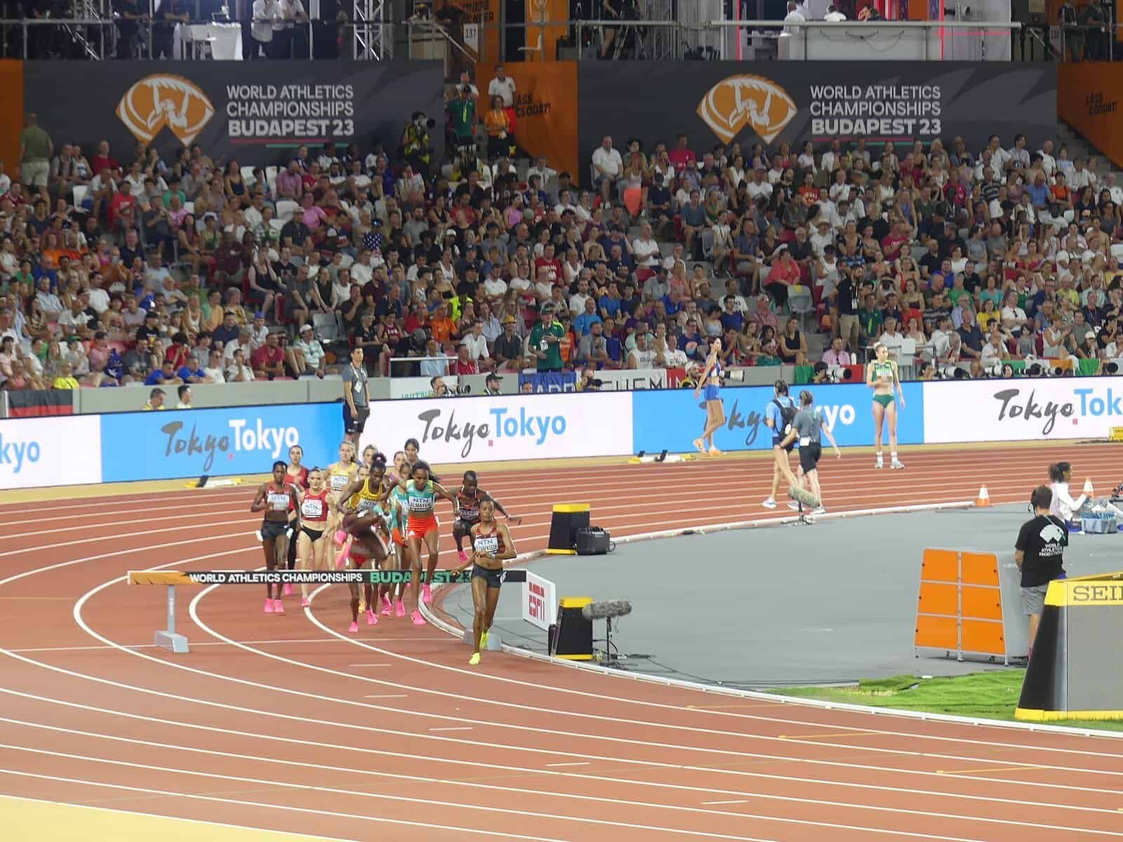 World Athletics Ultimate Championship.A full house at the National Athletics Centre in Budapest during a night session of the 2023 World Athletics Championships, a distance race rounding the bend