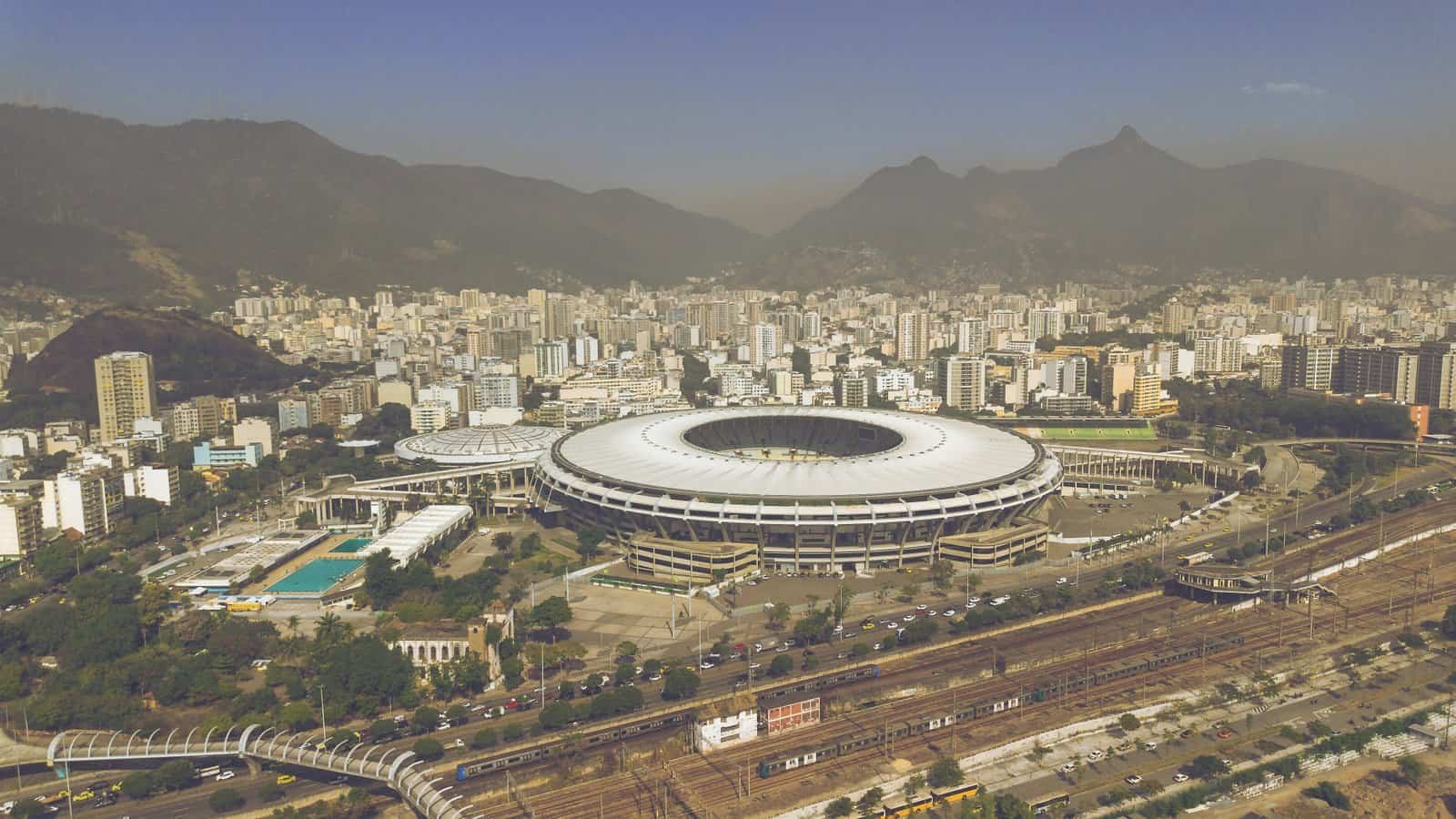 The Maracanã seen from the air, with Rio de Janeiro and the hills behind it